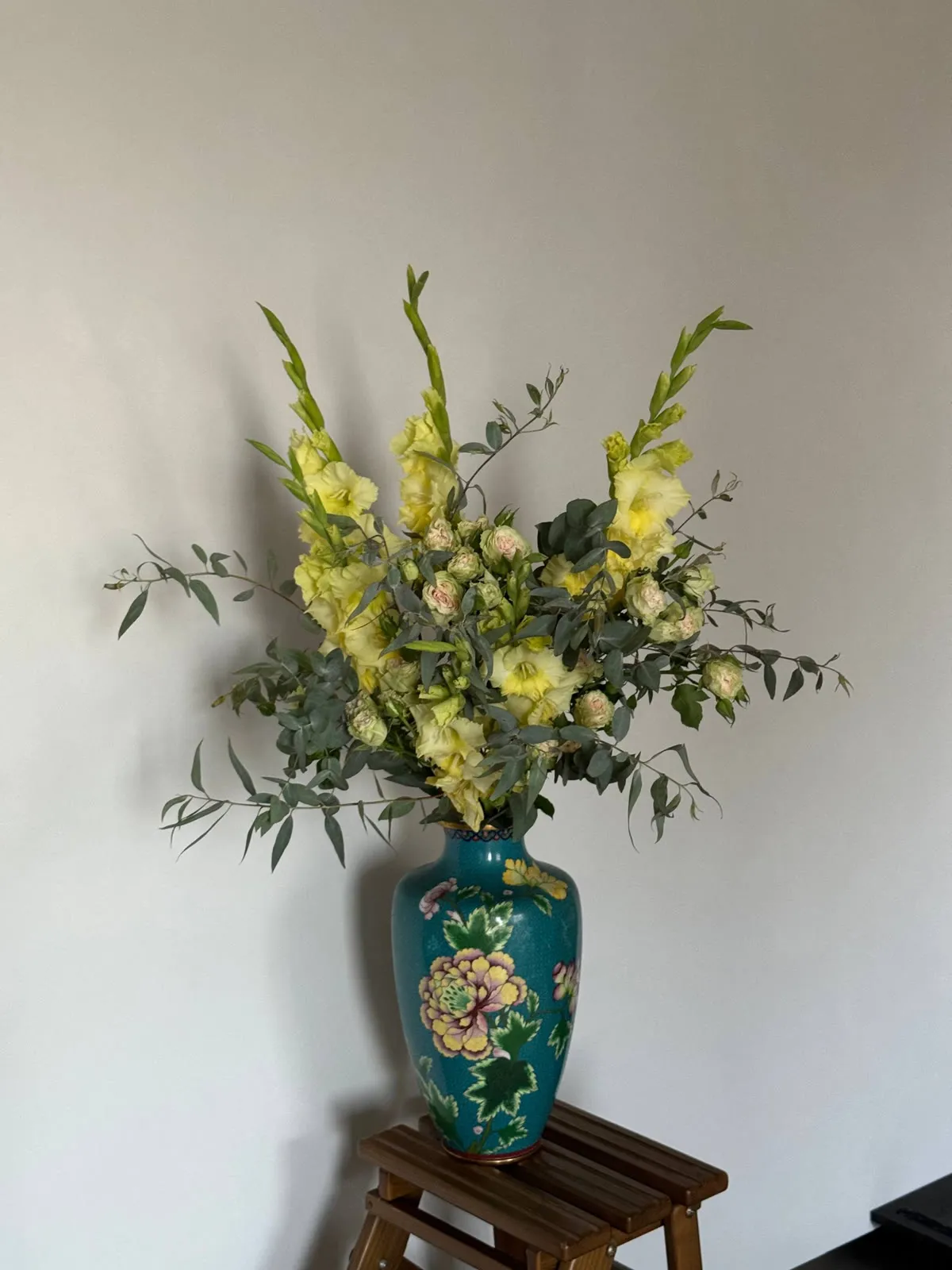 Yellow gladioli with eucalyptus